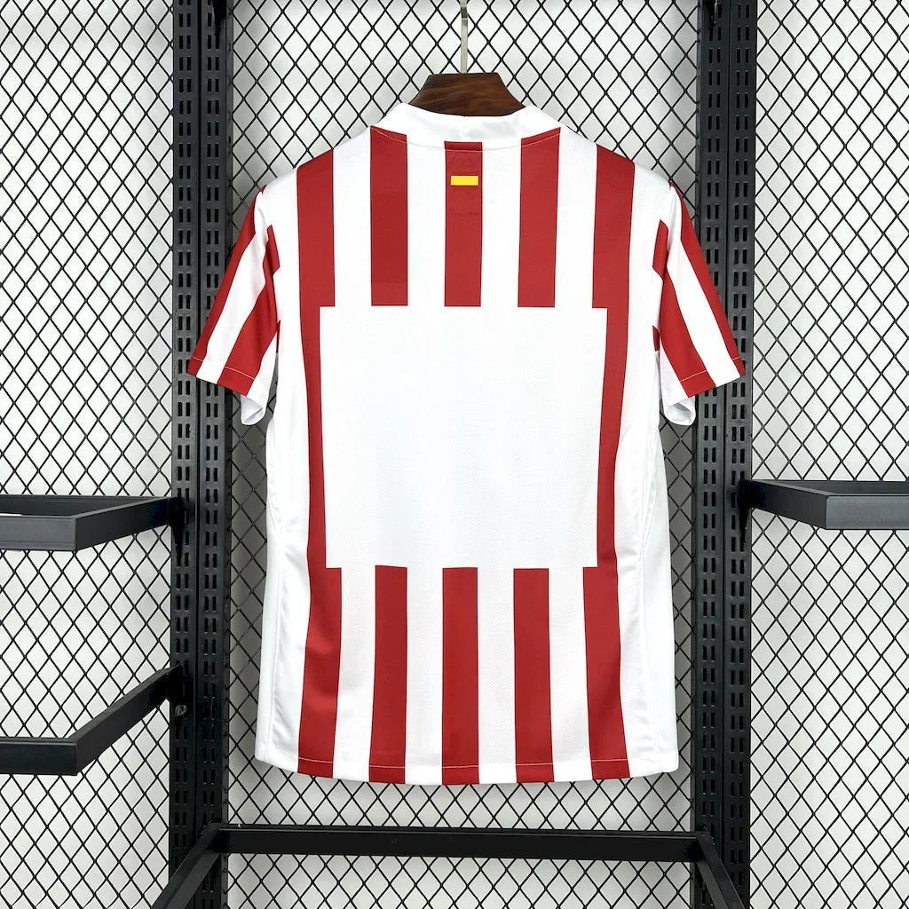Maillot de football Atlético Madrid 2025-26, marque Le 12-ème Maillot, vue front avec logo et design officiel.