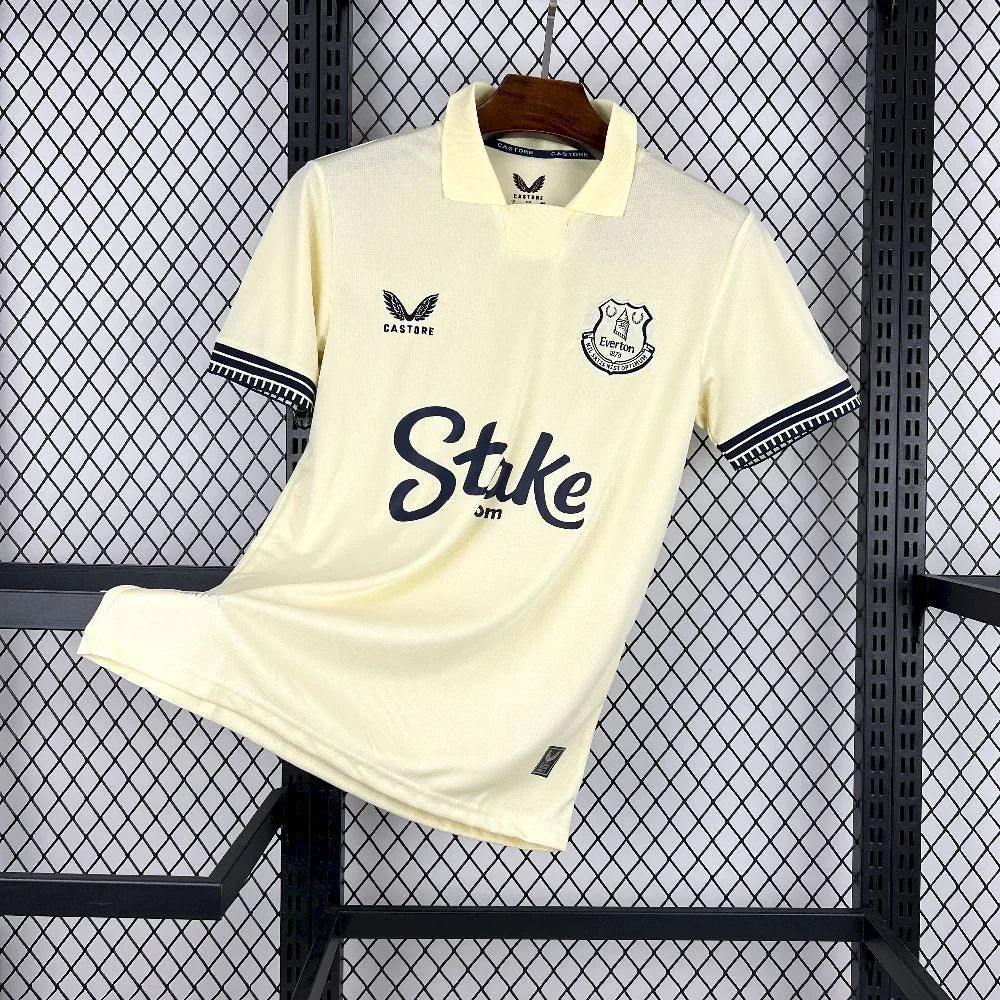 Maillot extérieur Everton 2025-26 de Le 12 -ème Maillot, maillot de football bleu avec logo de l'équipe.