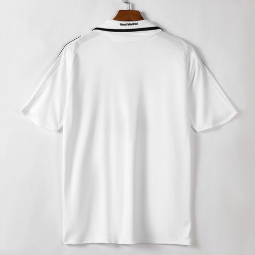 Maillot domicile rétro du Real Madrid 2008-2009, marque Le 12-ème Maillot, vue de face avec logo et détails du maillot.