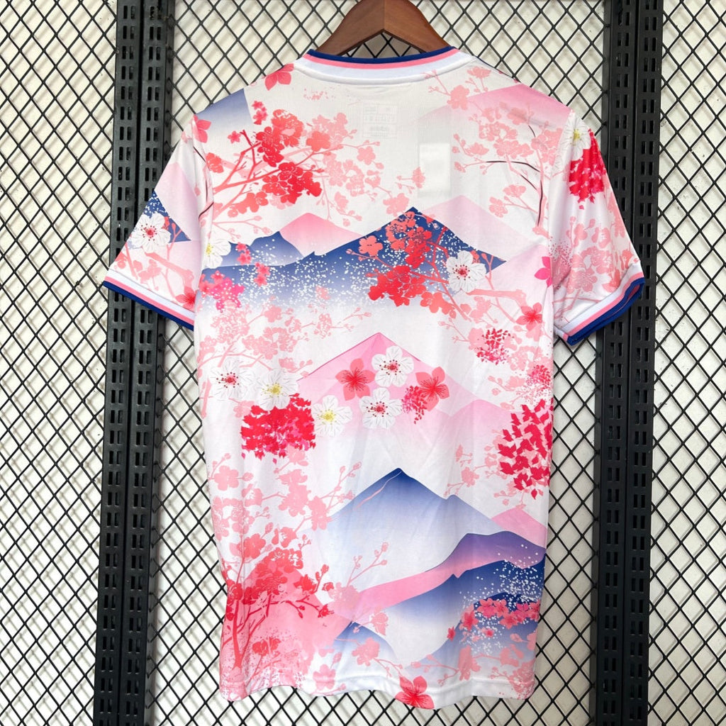 Maillot japonais rose pour enfants 25/26 ans, marque Le 12 -ème Maillot, avec design spécial et logo visible.