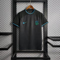 Maillot Le 12 Brésil saison 2022-2023 édition spéciale noir, vue de face avec détails du design sur le maillot.