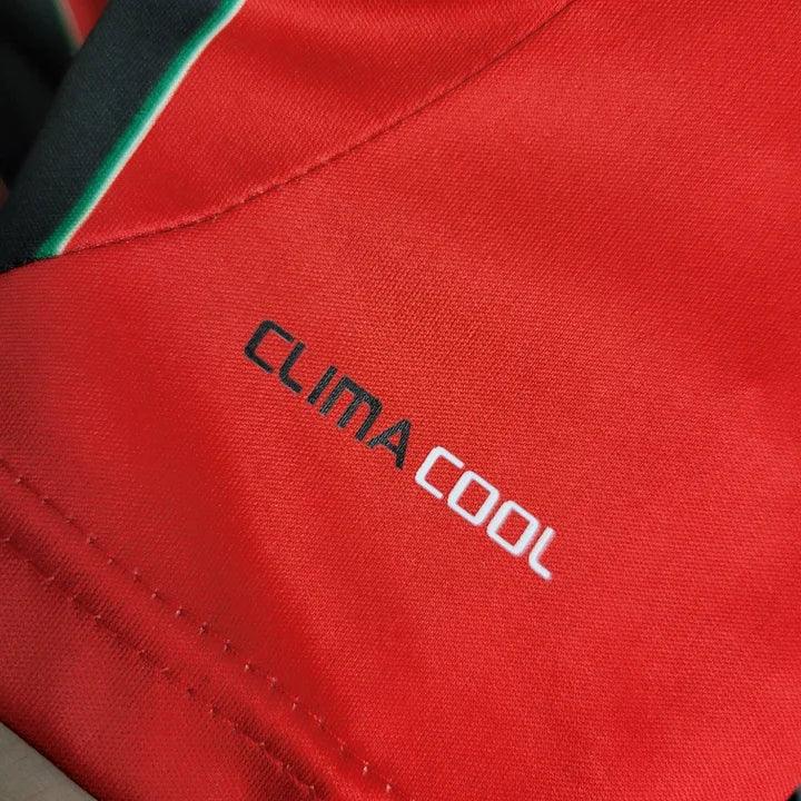 Maillot rétro AC Milan 2012-2013 de la marque Le 12-ème, vue de face avec logo et détails du maillot de football.