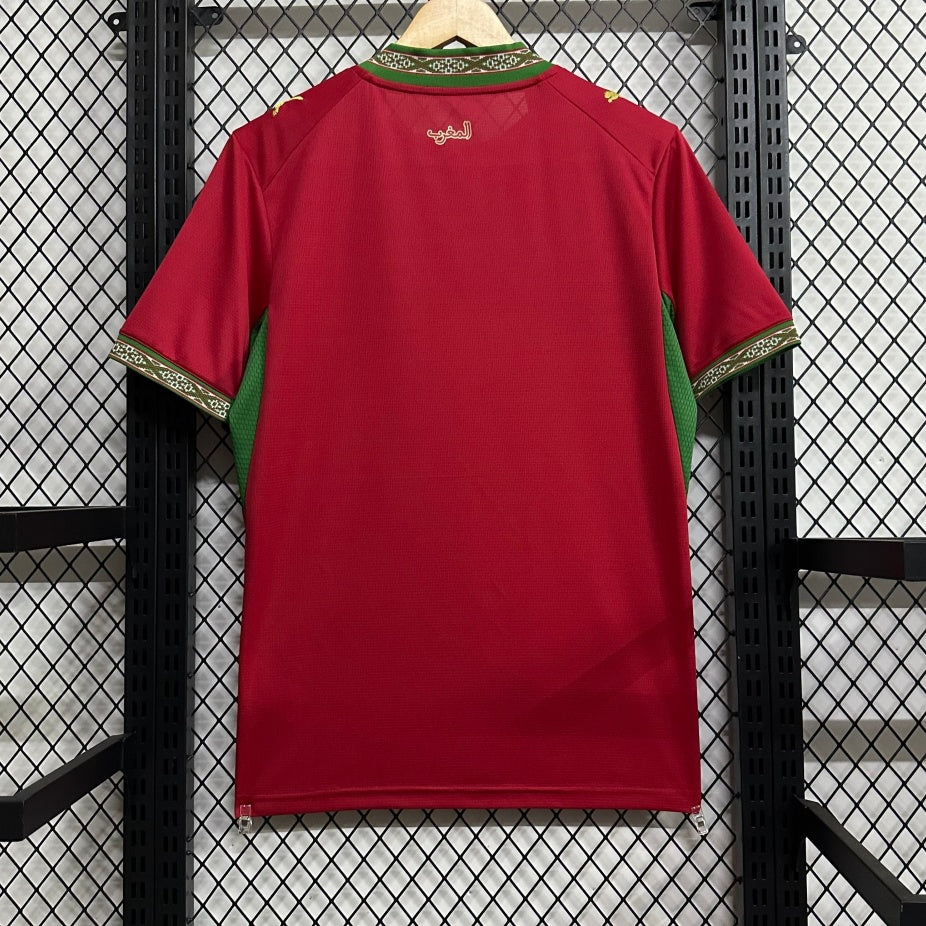 Maillot domicile Maroc 25/26 de Le 12 -ème Maillot, maillot de football avec couleurs rouge et vert, logo de l'équipe marocain visible