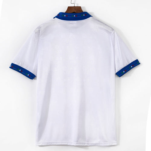 Maillot extérieur rétro de l'équipe d'Italie 1994, marque Le 12, en bleu avec logo national visible.