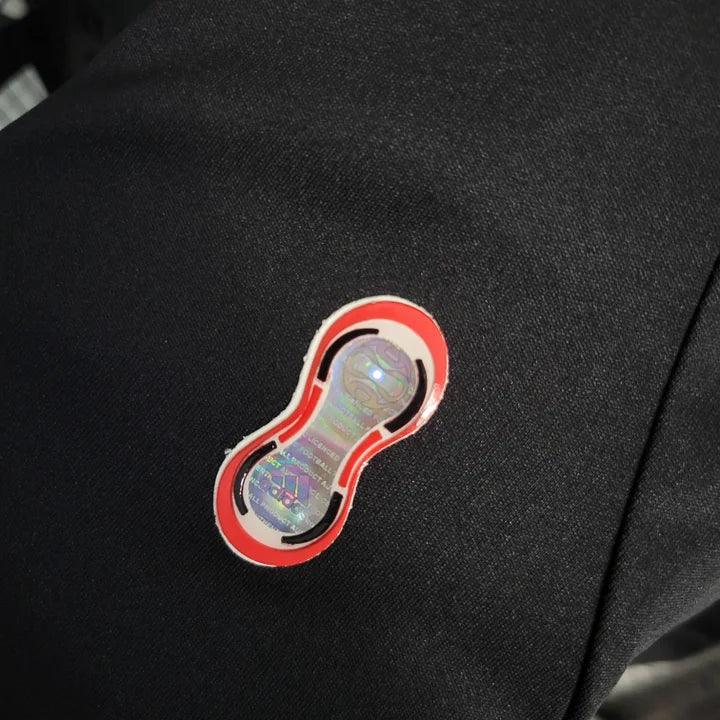 Maillot rétro de football AC Milan 2007-2008, marque Le 12-ème Maillot, vue de face avec logo et détails du design.