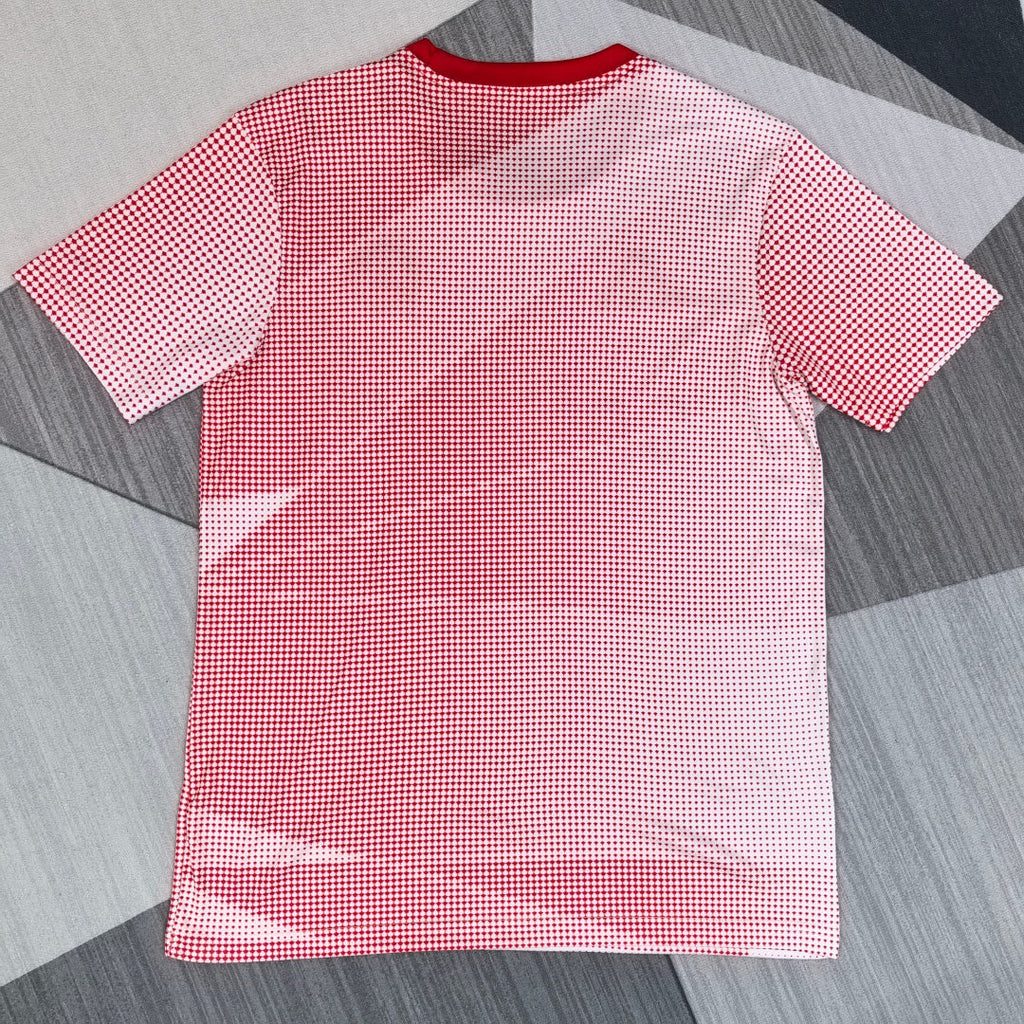 Maillot 25/26 Canada Le 12 -ème Maillot, maillot de sport bleu avec logo du Canada et détails en rouge et blanc.