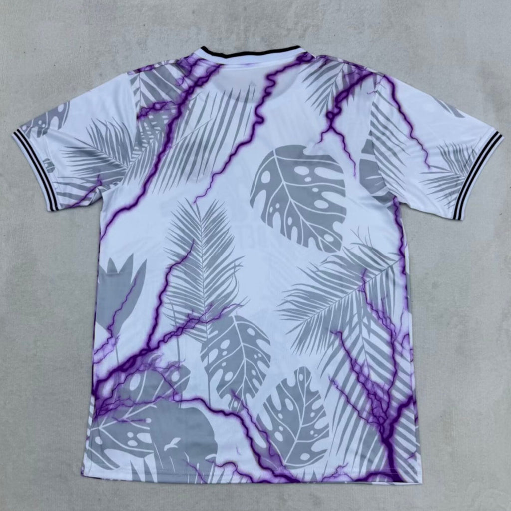 Maillot de football violet Real Madrid, taille 25/26, marque Le 12 -ème Maillot, logo et design distinctifs visibles.