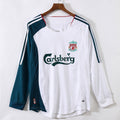 Maillot rétro Extérieur Liverpool 2006-2007, manches longues, marque Le 12, avec logo et design emblématique.