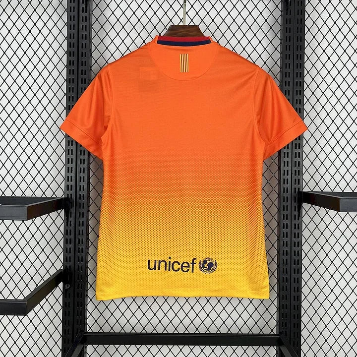 Maillot de football FC Barcelone 2012-2013 rétro, marque Le 12-ème Maillot, vue front avec logo du club et détails du design.