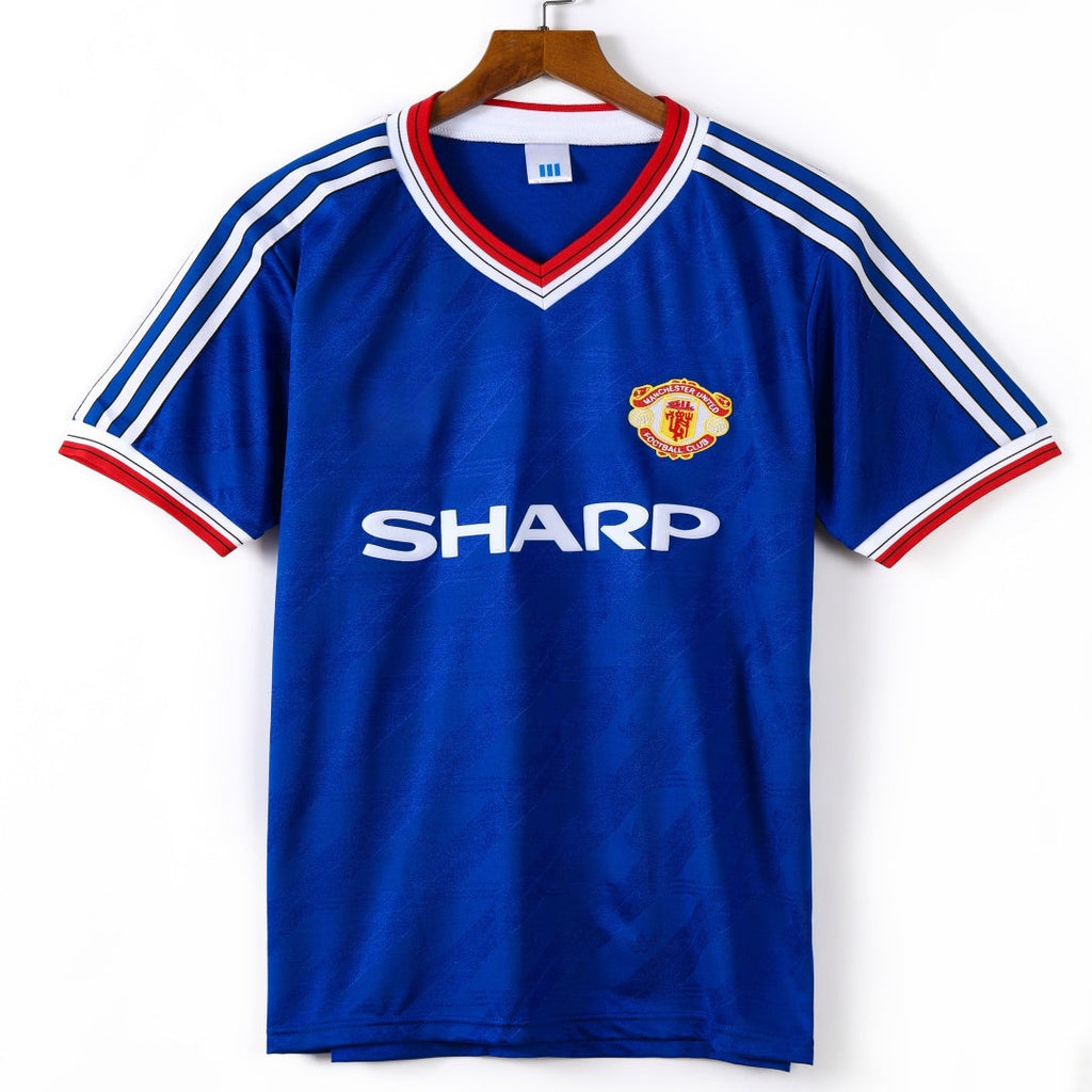 Maillot Manchester United Third Retro 1986-1988 par Le 12ème Maillot, maillot de football vintage avec logo et détails traditionnels