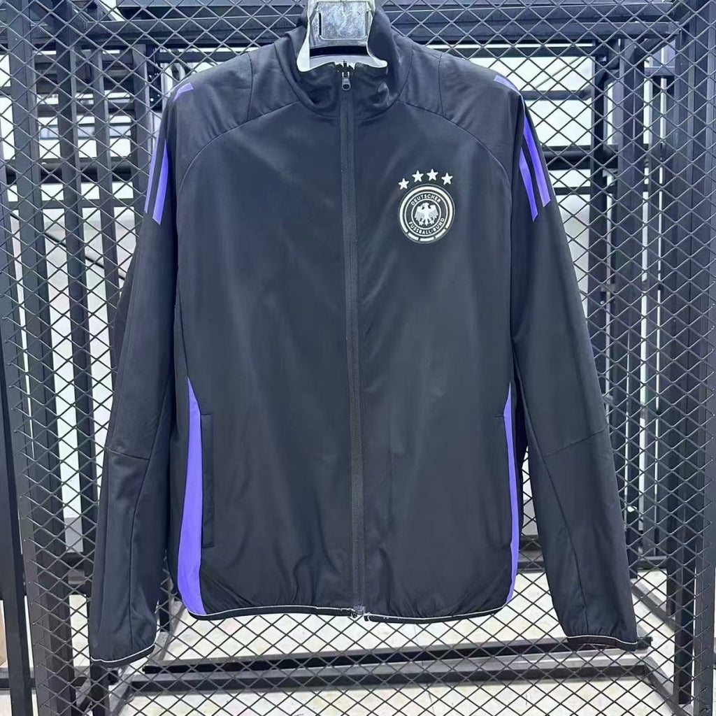 Veste coupe-vent réversible Le 12 -ème Maillot Allemagne, tissu léger noir et jaune, vue frontale, détail du design.