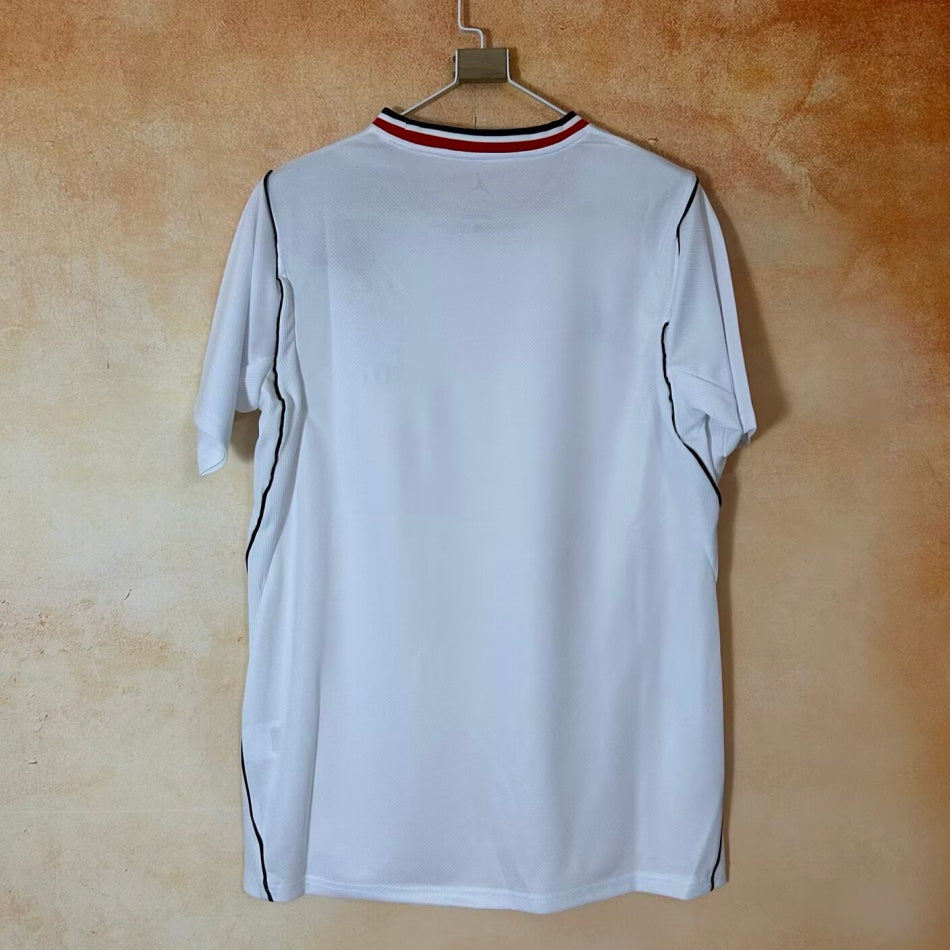 Maillot extérieur France 25/26 Le 12 -ème Maillot, maillot de football bleu avec logo national, vue de face.