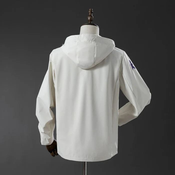 Veste coupe-vent réversible Le 12ème Maillot en blanc, légère et pratique, avec design simple et tissu respirant visible sur l'image.