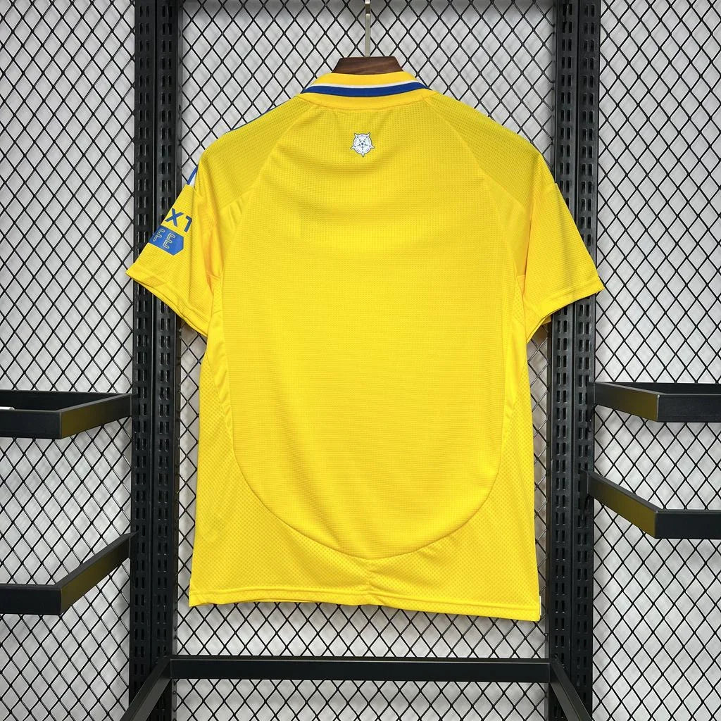 Maillot extérieur Leeds United 2024-25 de la marque Le 12-ème Maillot, vue de face avec logo et détails de l'équipe.