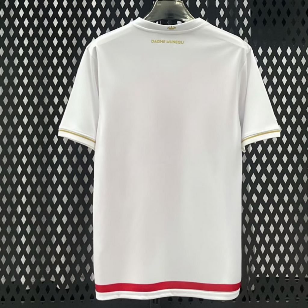 Maillot domicile 25/26 AS Monaco Le 12-ème Maillot, maillot de football bleu avec logo et détails blancs.