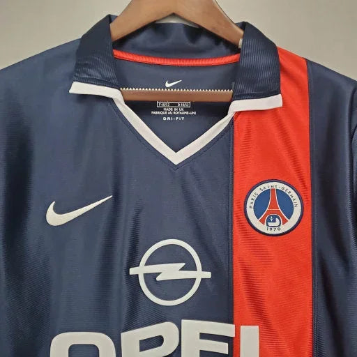 Maillot domicile rétro Paris Saint Germain 1998 de la saison, marque Le 12 -ème Maillot, vue de face avec logo et détails classiques.