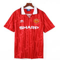 Maillot domicile rétro Manchester United 1992-1994, marque Le 12-ème Maillot, vue de face avec logo et détails du maillot.