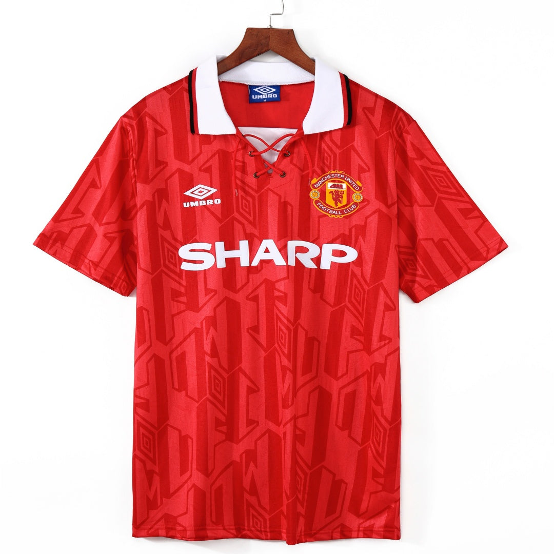 Maillot domicile rétro Manchester United 1992-1994, marque Le 12-ème Maillot, vue de face avec logo et détails du maillot.