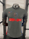 Maillot extérieur du FC Barcelone 2024-25 de la marque Le 12, vue de face avec logo et design officiel.
