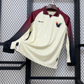Maillot extérieur manches longues Le 12 -ème Maillot Venezia 2025-26, design sportif avec logo et couleurs vives.