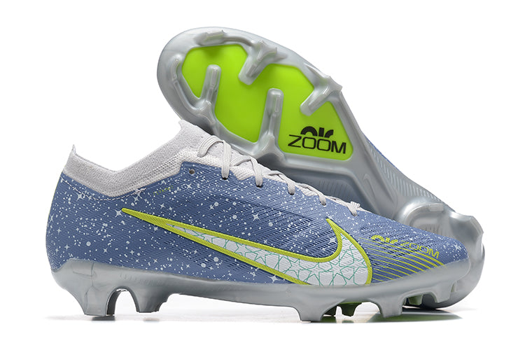 Crampons Mercurial Vapor XV Elite pour football, semelles en acier avec crampons en caoutchouc pour terrain gazon naturel.