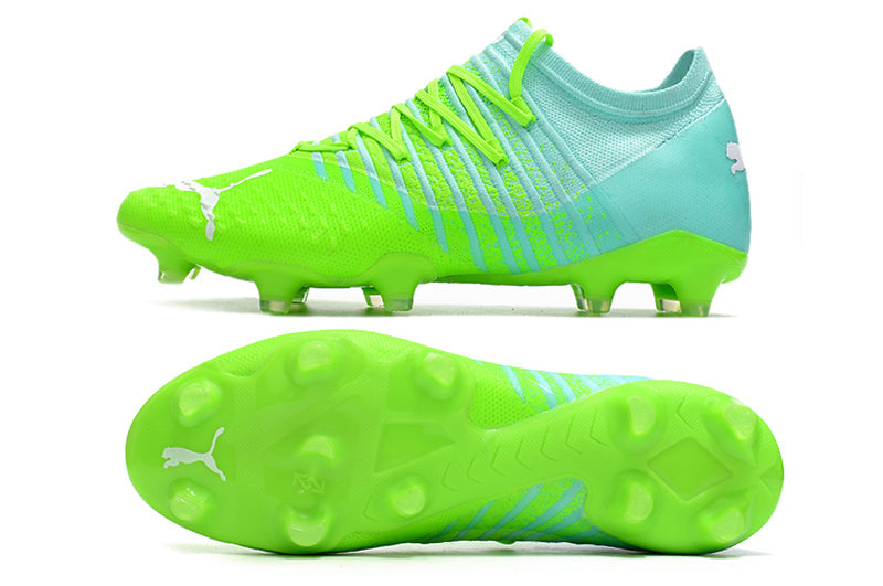 Crampons Future Z 1.3 Teazer FG de Le 12 -ème Maillot, semelles en caoutchouc et attaches métalliques pour football.