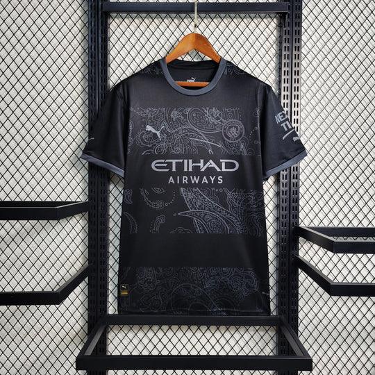 Maillot Manchester City édition Dragon 2024/25, maillot de football Le 12, devant avec logo et design moderne.