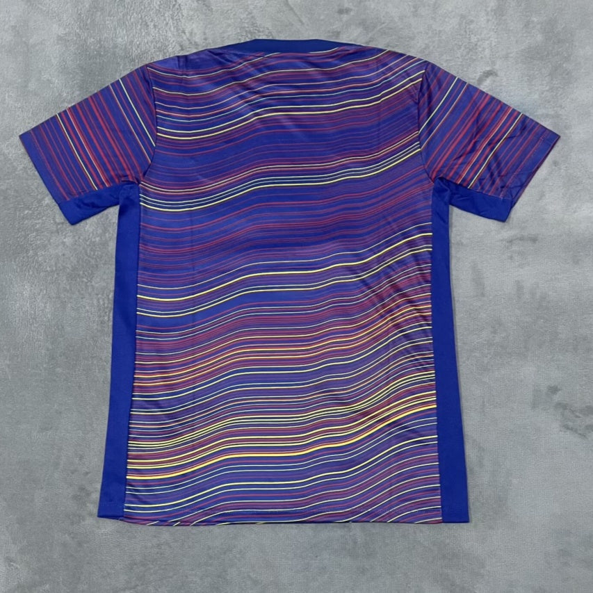 Maillot de football Barcelone 25/26 violet Le 12 -ème, vue de face, logo et détails du design visibles.