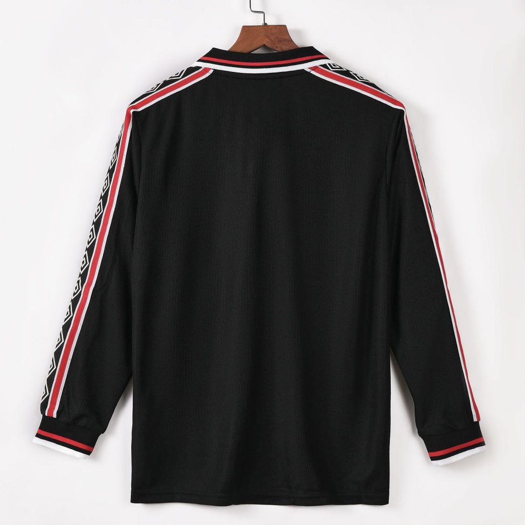 Maillot extérieur rétro Manchester United 1998-1999 à manches longues, marque Le 12 -ème Maillot, vue de face.
