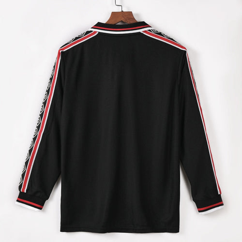 Maillot extérieur rétro Manchester United 1998-1999 à manches longues, marque Le 12 -ème Maillot, vue de face.