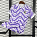 Maillot violet Real Madrid 25/26 Le 12 -ème Maillot, maillot de football avec logo et détails distinctifs visible.