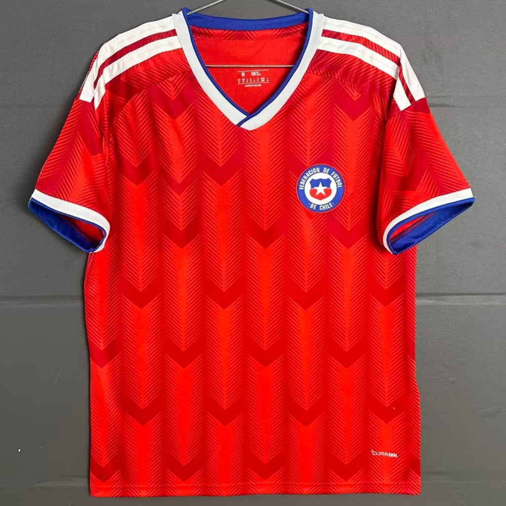 Maillot domicile Chili 25/26 Le 12 -ème Maillot, maillot de football rouge avec logo officiel et détails blancs.