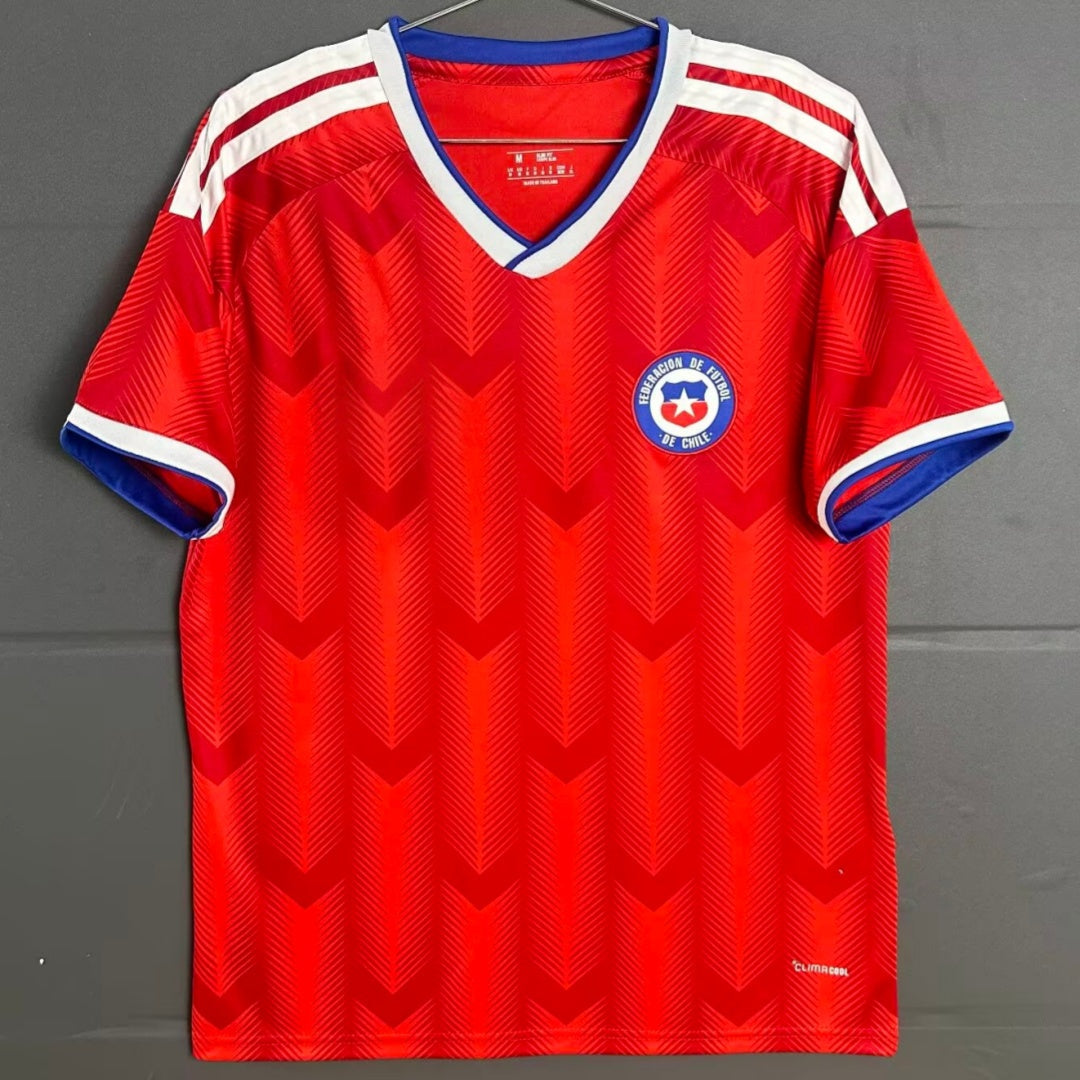 Maillot domicile Chili 25/26 Le 12 -ème Maillot, maillot de football rouge avec logo officiel et détails blancs.