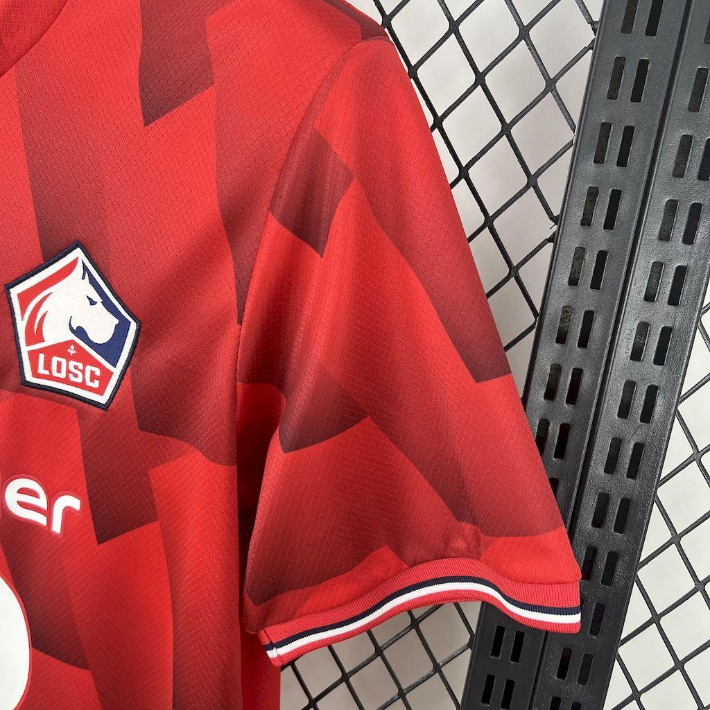 Maillot Lille 2025-26 Le 12 -ème Maillot, maillot de football bleu avec logo et détails du club Lille.