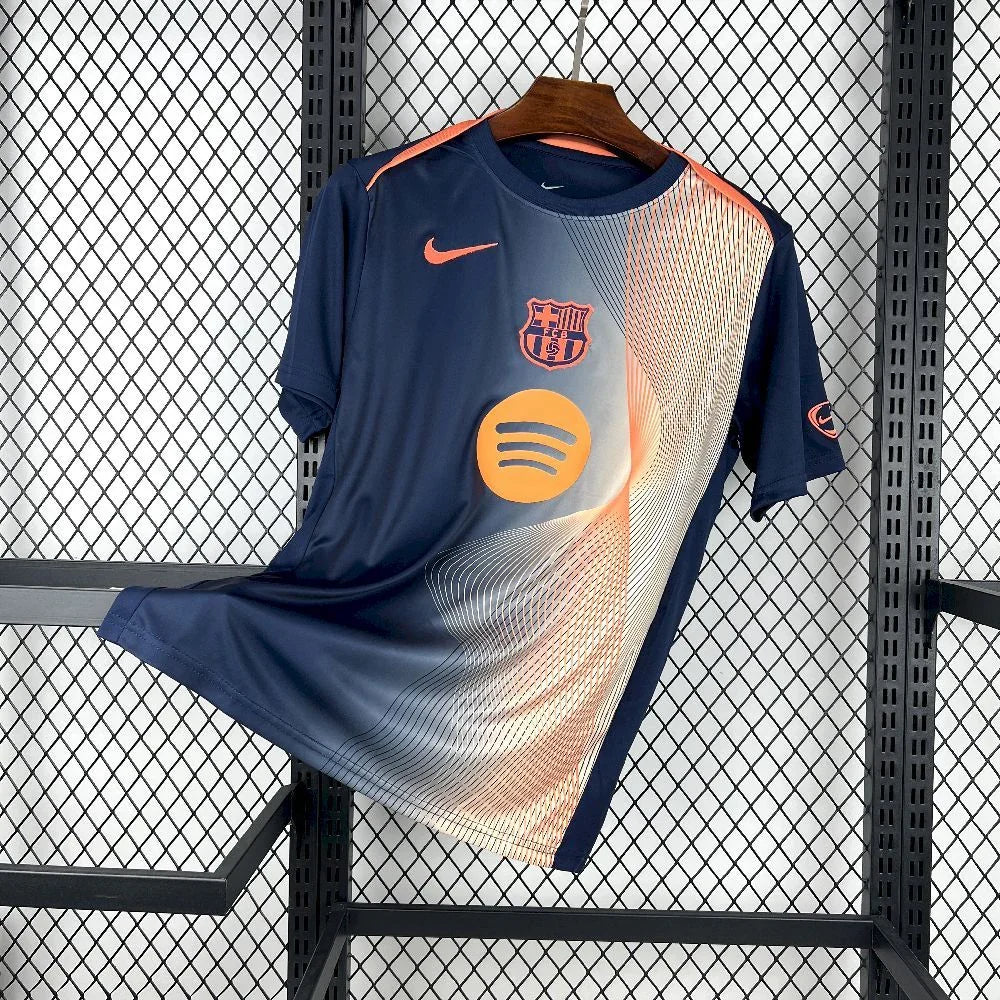 Maillot extérieur du FC Barcelone 2025-26, marque Le 12, avec logo et design officiel visible sur le tissu.