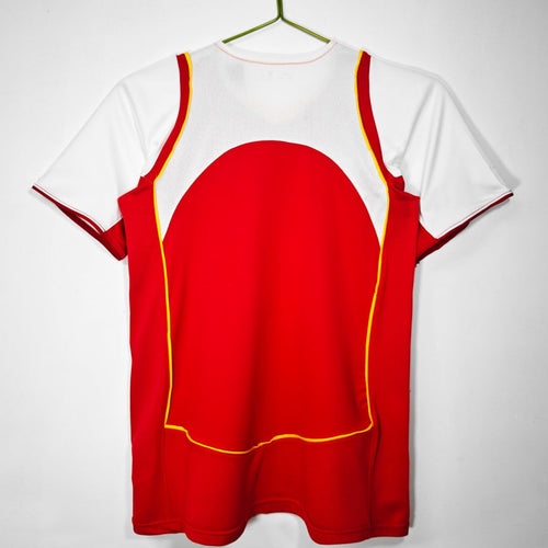 Maillot domicile rétro de l'Arsenal 2004-2005, marque Le 12 -ème Maillot, vue de face avec logo et détails du maillot.