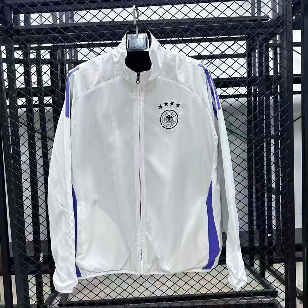 Veste coupe-vent réversible Le 12 -ème Maillot Allemagne R1017, façade avec logo et intérieur coloré, en tissu léger.