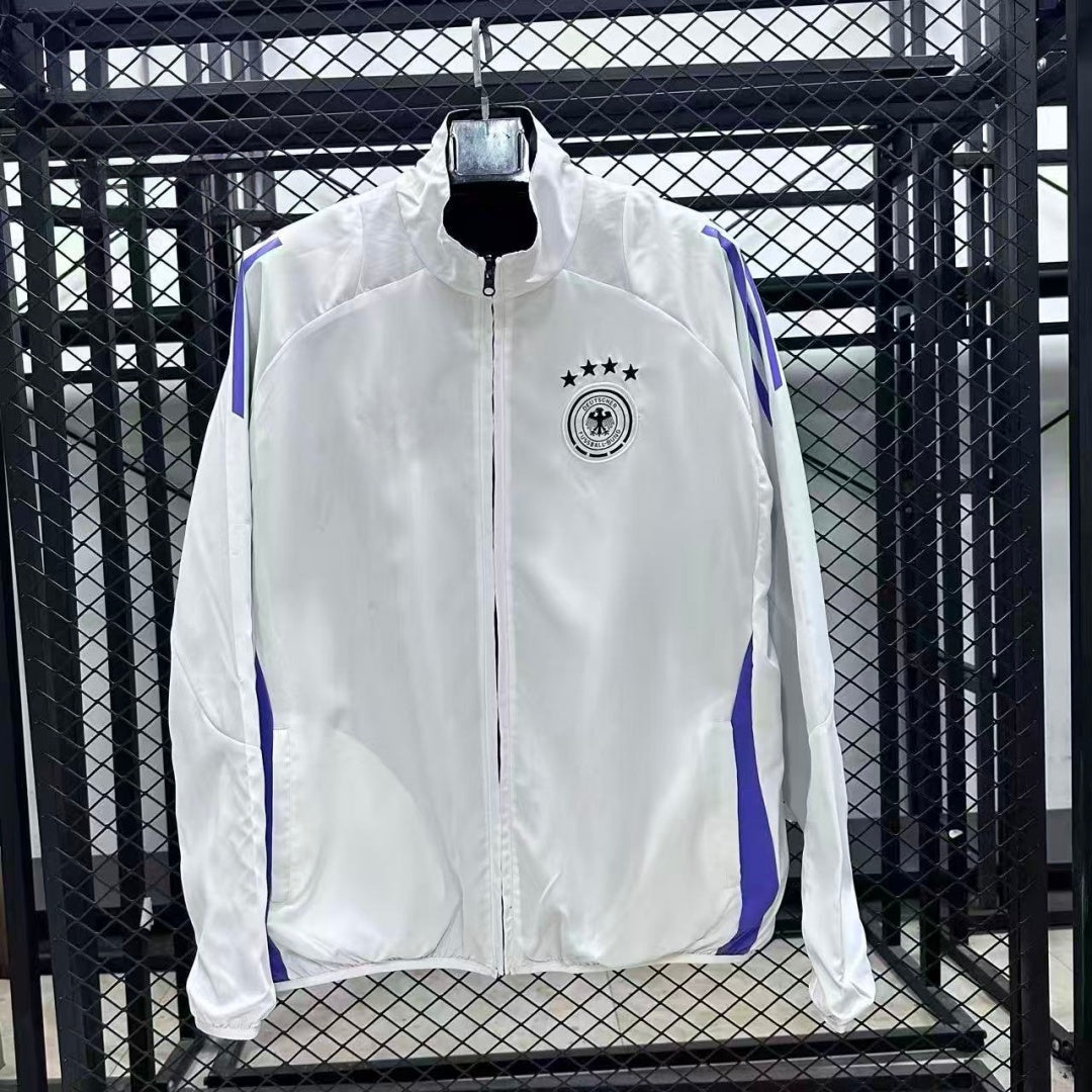 Veste coupe-vent réversible Le 12 -ème Maillot Allemagne R1017, façade avec logo et intérieur coloré, en tissu léger.