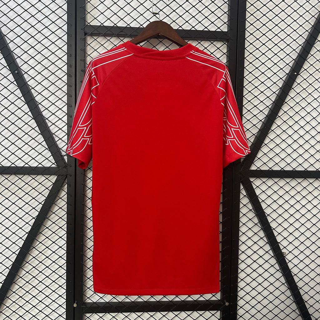 Maillot 24/25 PSG Fourth de Le 12 -ème Maillot, maillot de football avec logo du PSG et design coloré.