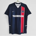 Maillot domicile rétro PSG 2002-2003 Le 12-ème Maillot, maillot de football rouge avec logo du club et détails blancs.