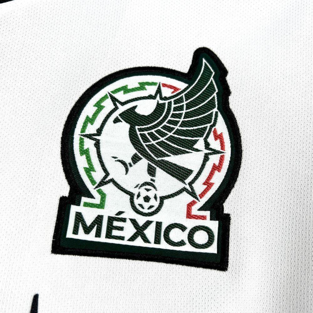 Maillot Mexique concept 2026 de la marque Le 12 -ème Maillot, vue de face avec design contemporain, couleurs bleu, blanc et rouge.