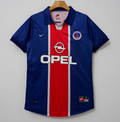 Maillot domicile rétro PSG 1994-1998 de la marque Le 12-ème, maillot de football avec logo et détails classiques.