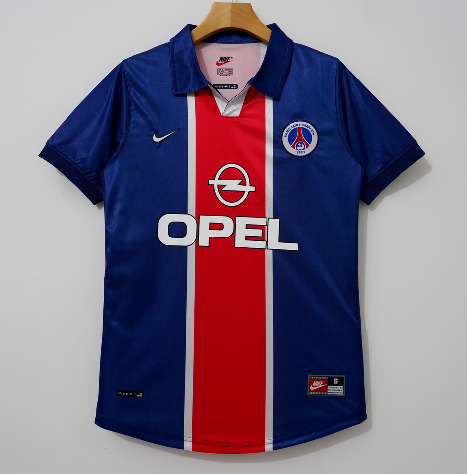 Maillot domicile rétro PSG 1994-1998 de la marque Le 12-ème, maillot de football avec logo et détails classiques.
