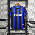 Maillot rétro de l'Inter Milan 1999-2000, marque Le 12 -ème Maillot, vue de face avec logo et détails du design.