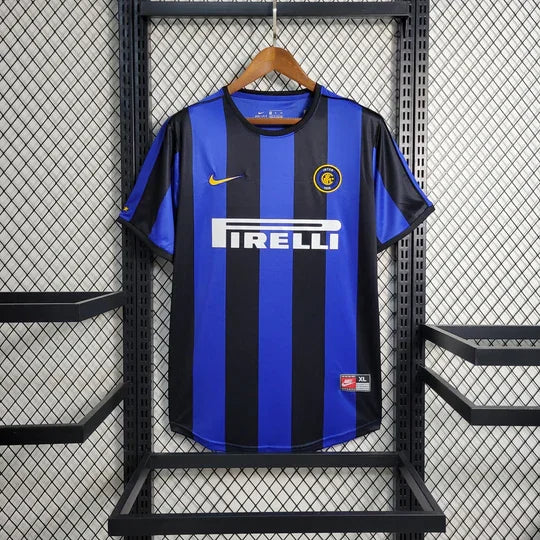 Maillot rétro de l'Inter Milan 1999-2000, marque Le 12 -ème Maillot, vue de face avec logo et détails du design.
