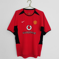 Maillot domicile rétro Manchester United 2002-2004, modèle Le 12 -ème Maillot, vue de face sur fond blanc.