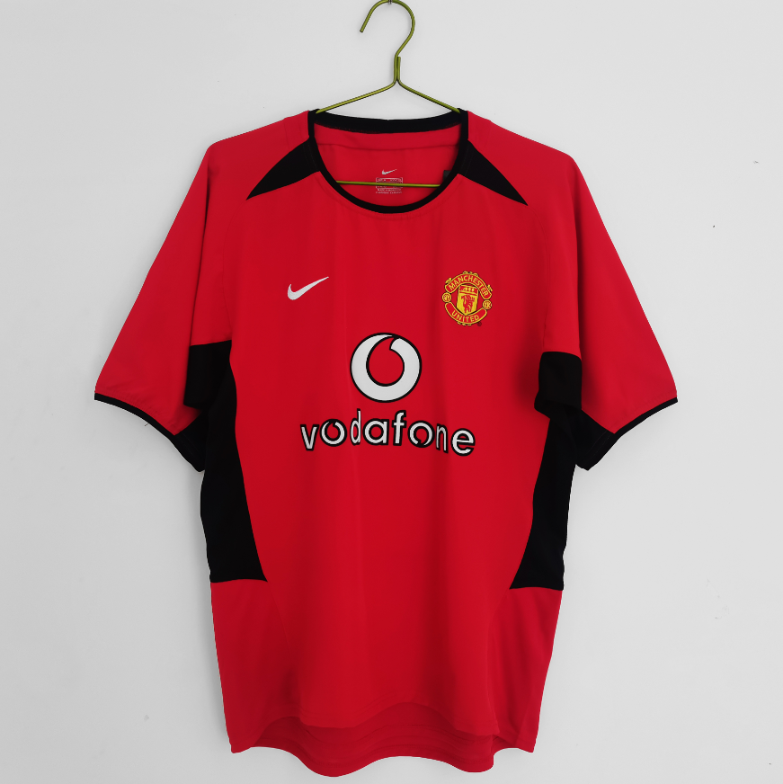 Maillot domicile rétro Manchester United 2002-2004, modèle Le 12 -ème Maillot, vue de face sur fond blanc.