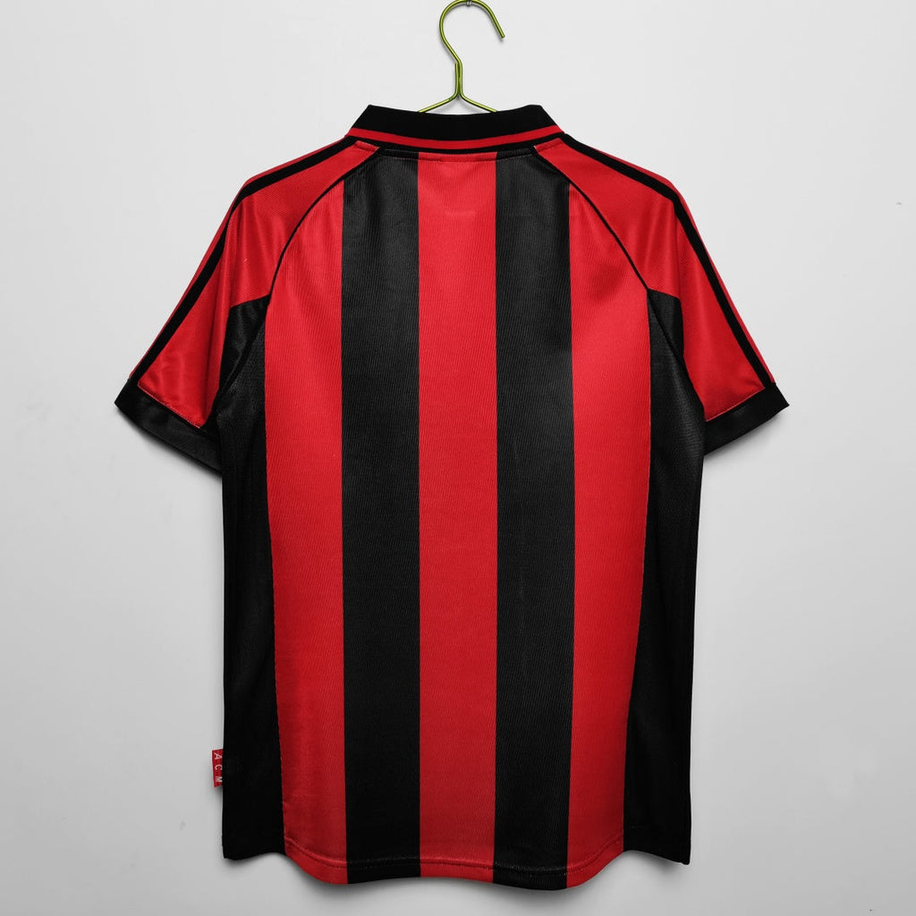 Maillot domicile rétro de l'AC Milan 1998-1999, marque Le 12 -ème Maillot, avec les couleurs classiques du club.