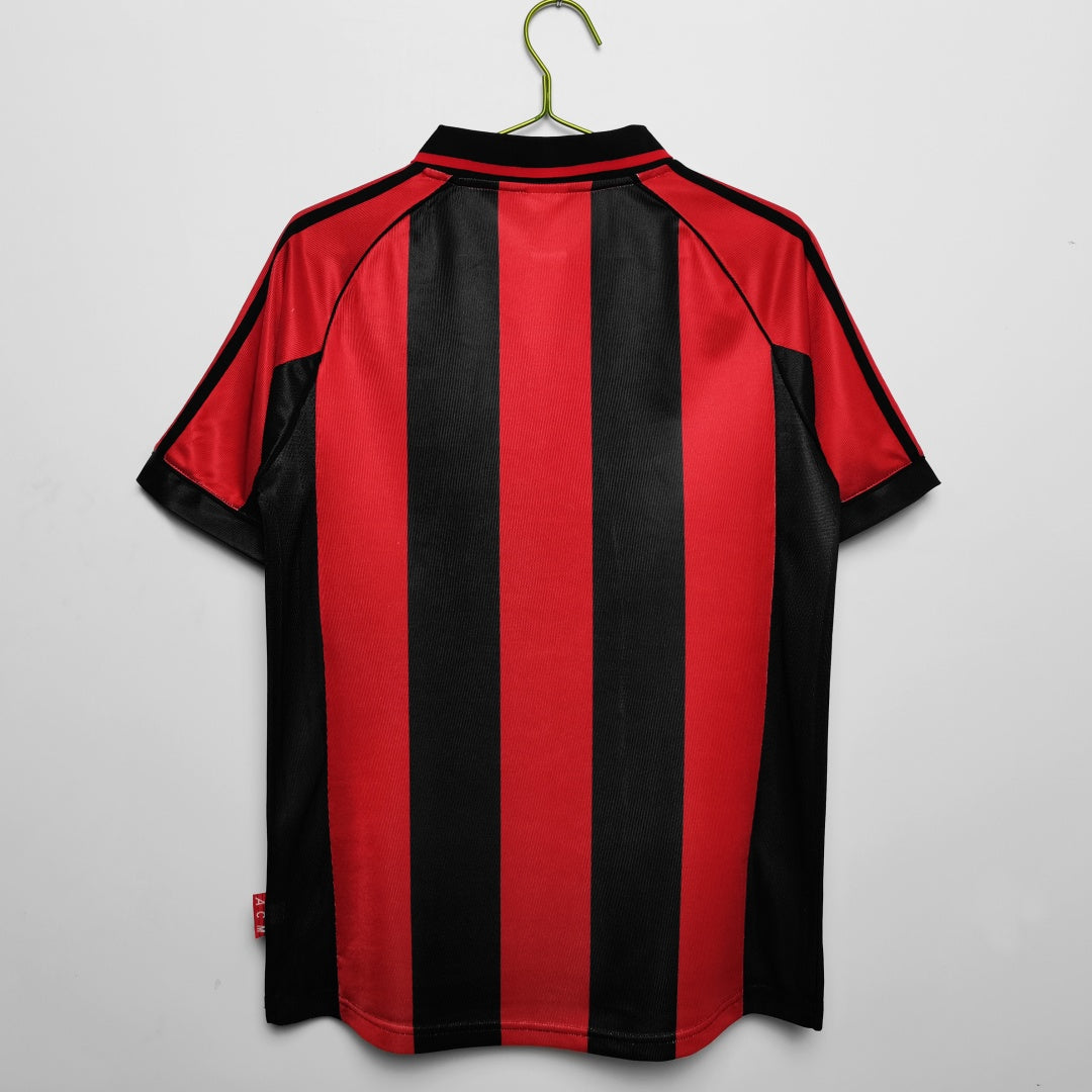 Maillot domicile rétro de l'AC Milan 1998-1999, marque Le 12 -ème Maillot, avec les couleurs classiques du club.