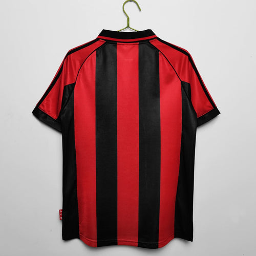 Maillot domicile rétro de l'AC Milan 1998-1999, marque Le 12 -ème Maillot, avec les couleurs classiques du club.